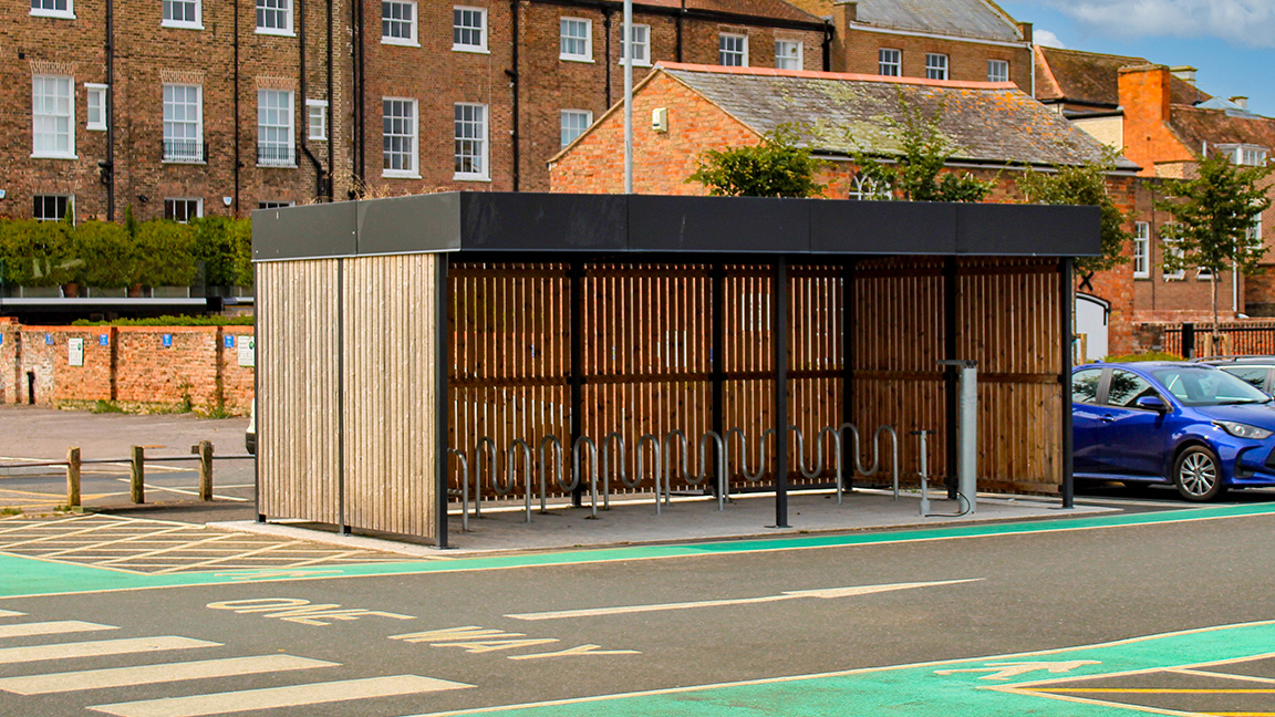 Cycle Hub with green roof and solar lighting - featuring bike parking including cargo bikes - plus repair station and bike pump