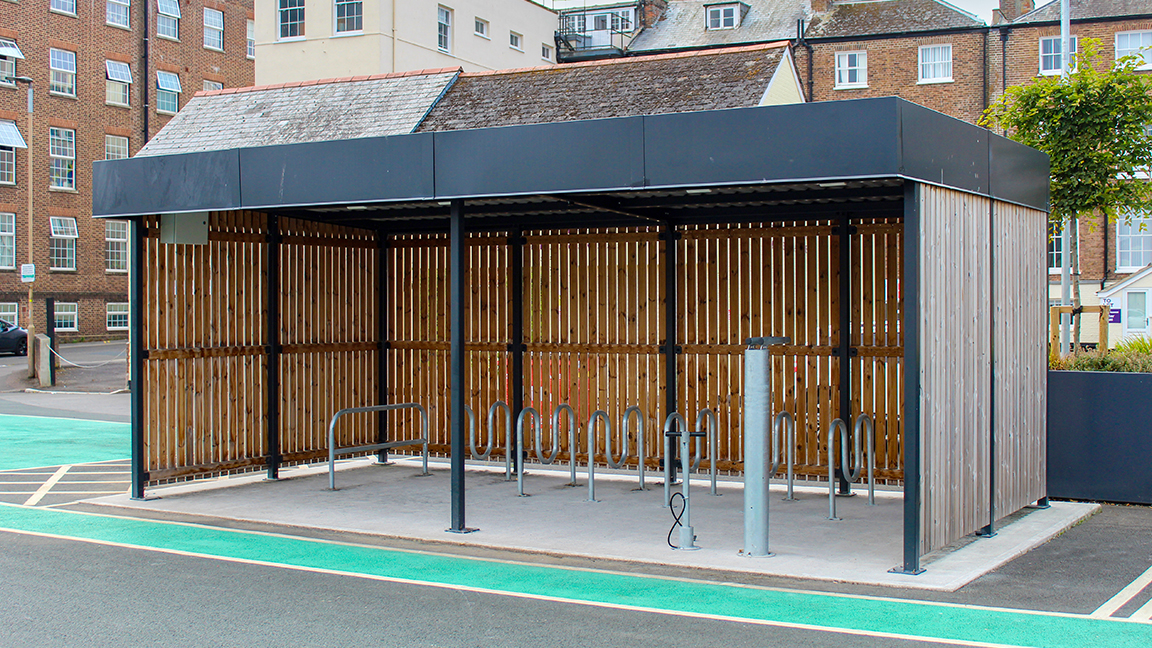 Cycle Hub with green roof and solar lighting - featuring bike parking including cargo bikes - plus repair station and bike pump