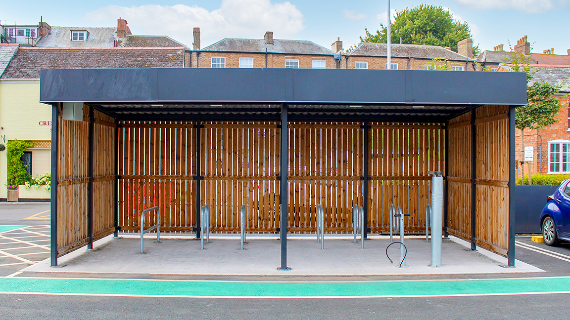 Cycle Hub with green roof and solar lighting - featuring bike parking including cargo bikes - plus repair station and bike pump