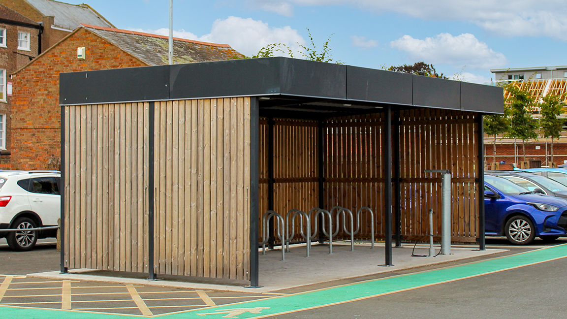 Cycle Hub with green roof and solar lighting - featuring bike parking including cargo bikes - plus repair station and bike pump