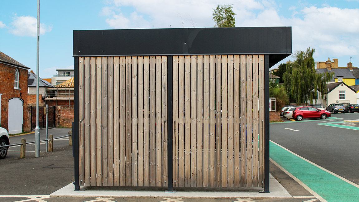 Cycle Hub with green roof and solar lighting - featuring bike parking including cargo bikes - plus repair station and bike pump