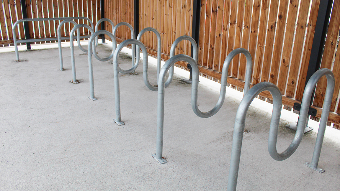 Cycle Hub with green roof and solar lighting - featuring bike parking including cargo bikes - plus repair station and bike pump