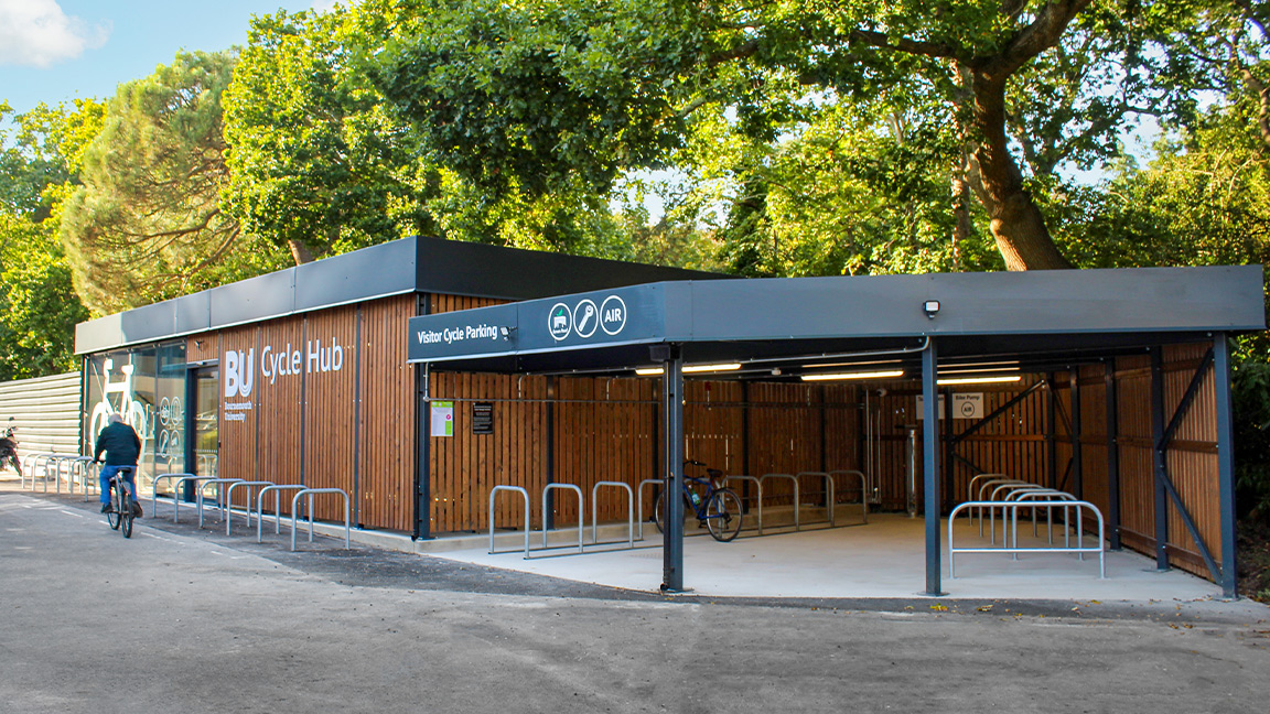 Cycle Hub with green roof - featuring bike parking including cargo bikes - plus repair station and bike pump