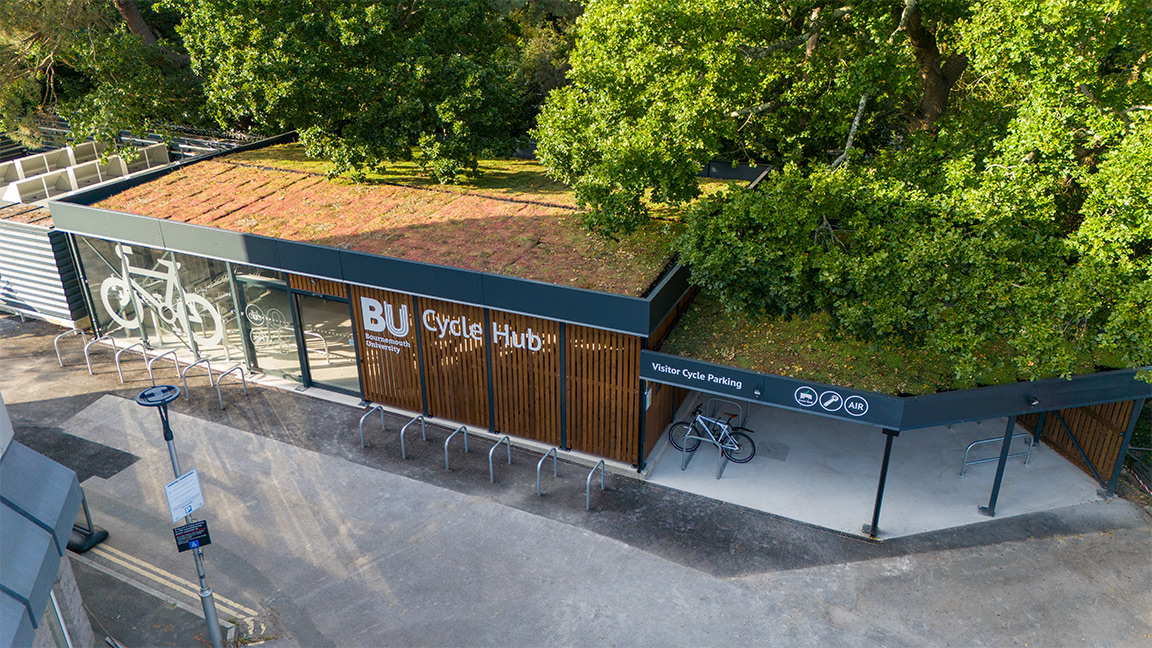 Cycle Hub with green roof - featuring bike parking including cargo bikes - plus repair station and bike pump