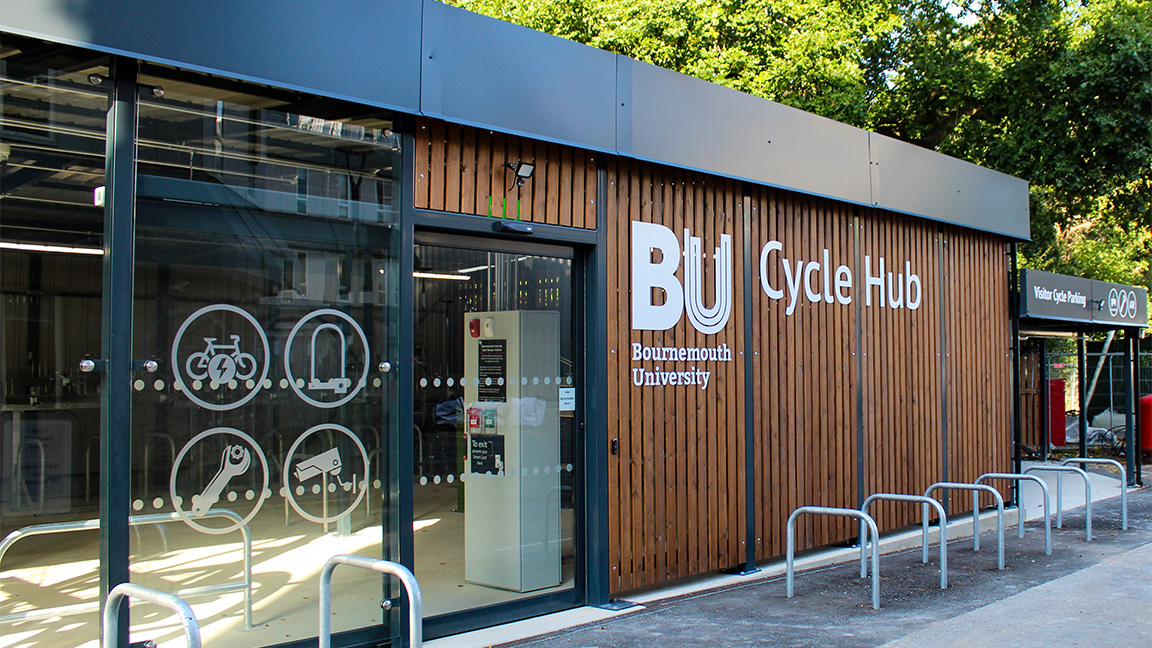 Cycle Hub with green roof - featuring bike parking including cargo bikes - plus repair station and bike pump