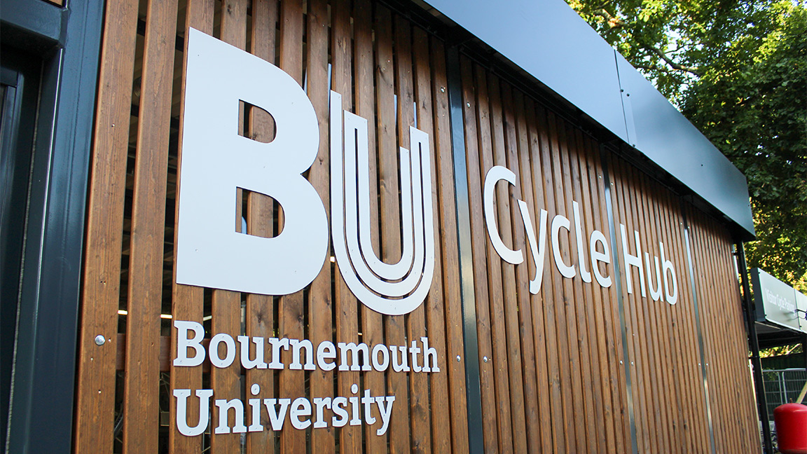 Cycle Hub with green roof - featuring bike parking including cargo bikes - plus repair station and bike pump