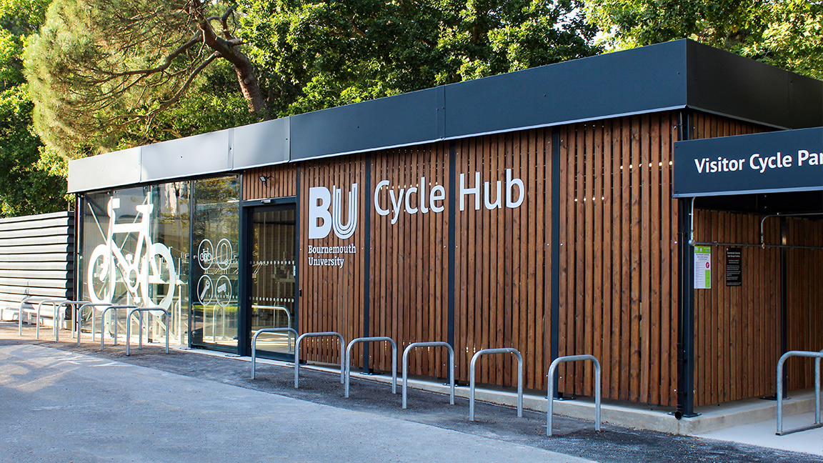 Cycle Hub with green roof - featuring bike parking including cargo bikes - plus repair station and bike pump