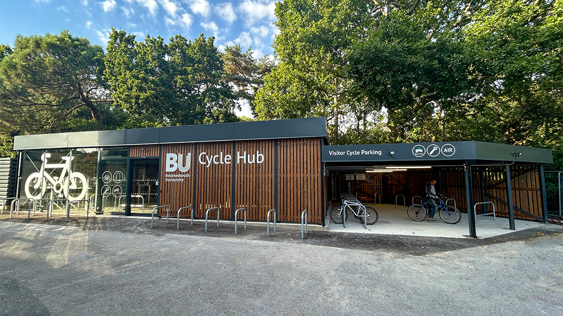 Cycle Hub with green roof - featuring bike parking including cargo bikes - plus repair station and bike pump