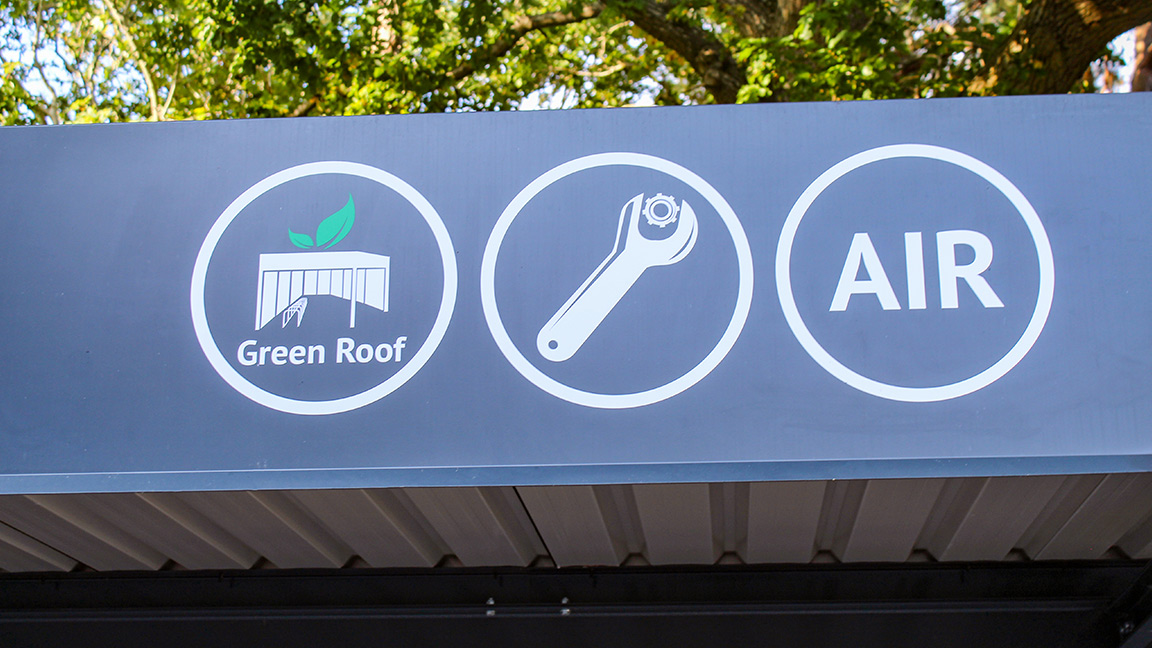 Cycle Hub with green roof - featuring bike parking including cargo bikes - plus repair station and bike pump