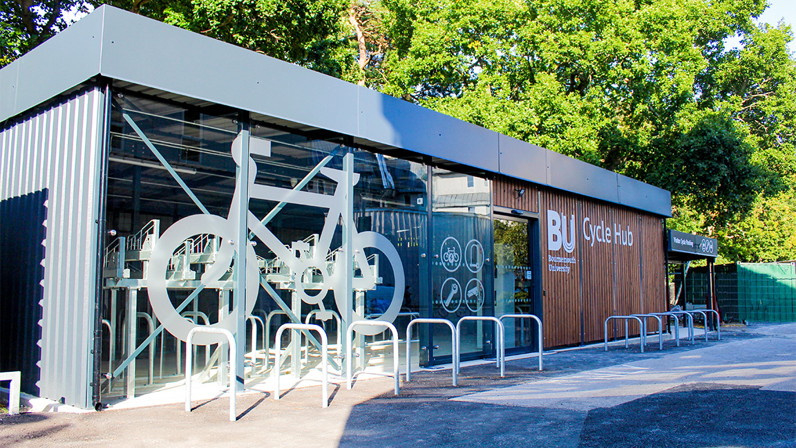 Cycle Hub with green roof - featuring bike parking including cargo bikes - plus repair station and bike pump