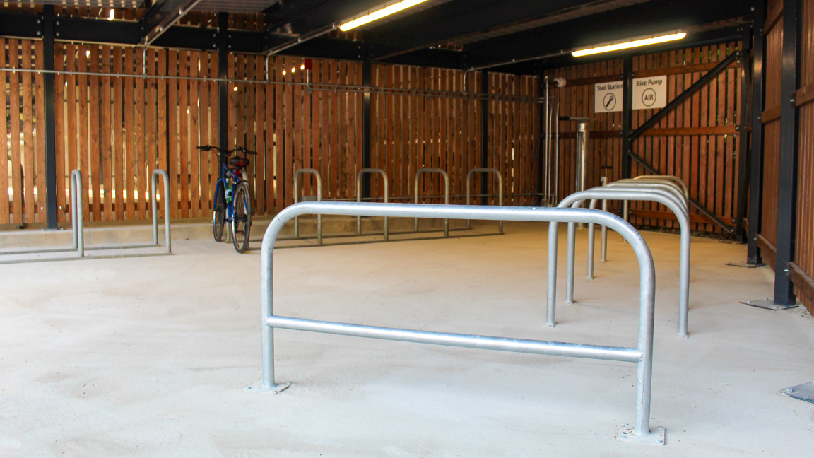 Cycle Hub with green roof - featuring bike parking including cargo bikes - plus repair station and bike pump